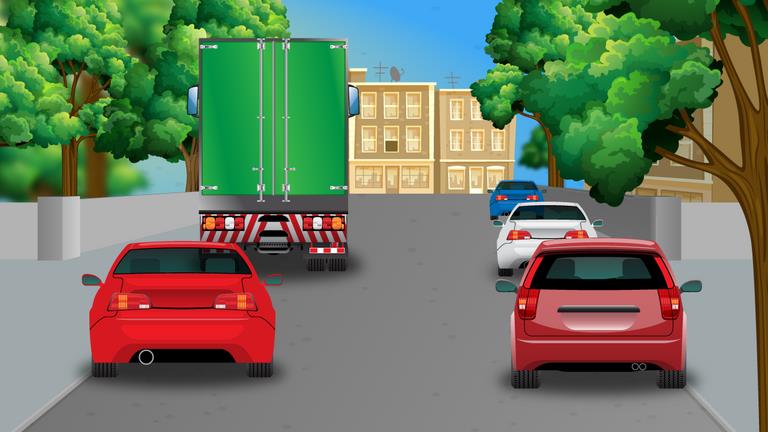 When driving on this one-way street with vehicles parked on both sides, what should a driver be prepared for?